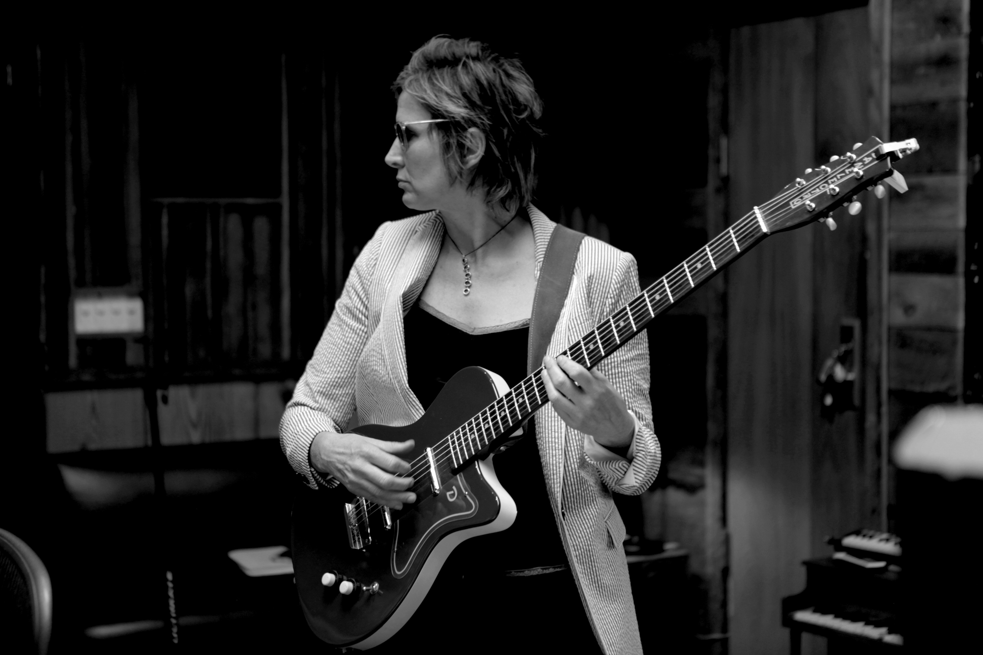 Singer Annie Keating playing guitar