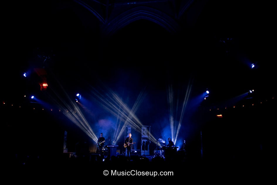 Laser lights behind Dave Hause and Time Hause on stage