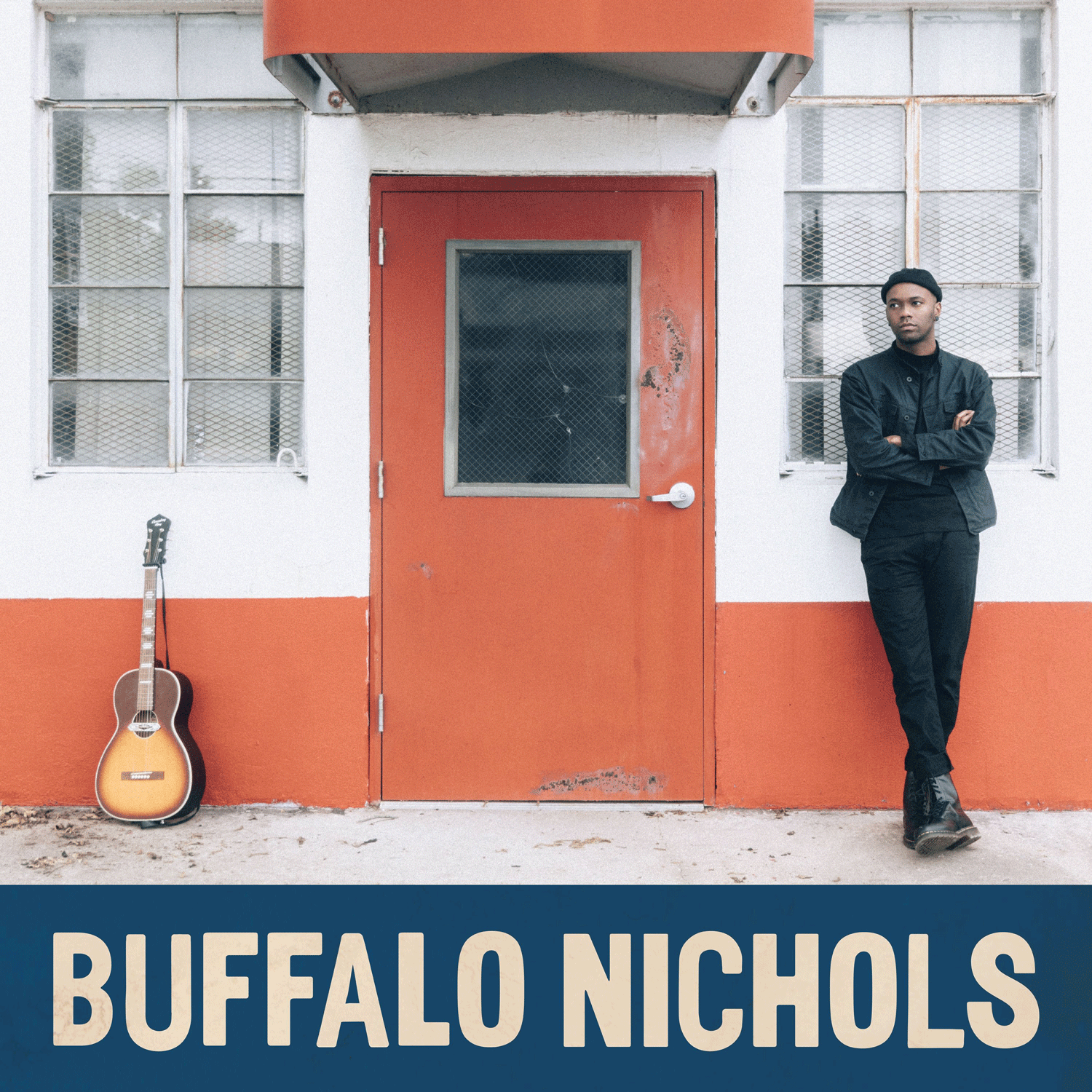 Buffalo Nichols leaning against a wall