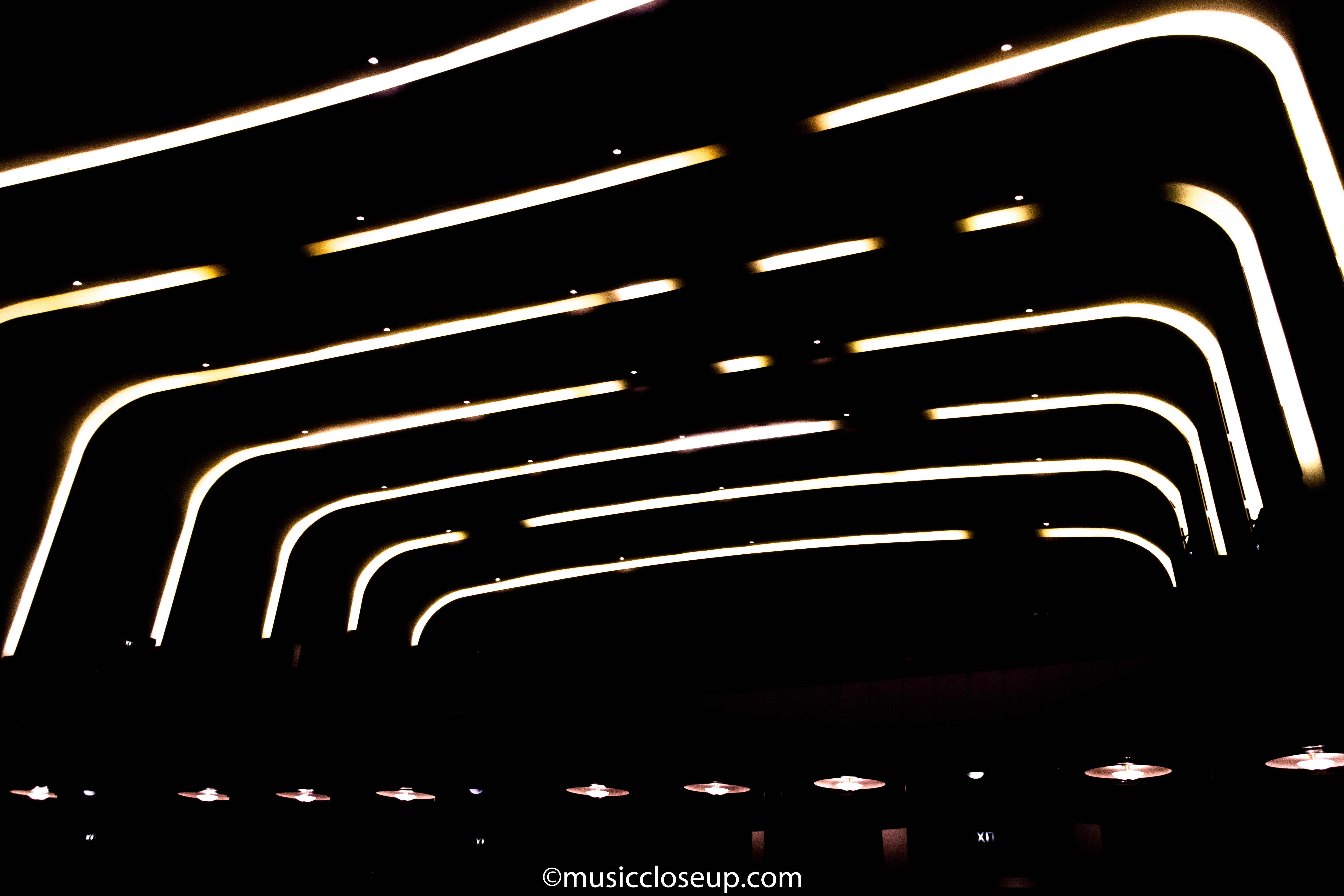 The interior of Liverpool Philharmonic Hall lit up with the crowd in darkness