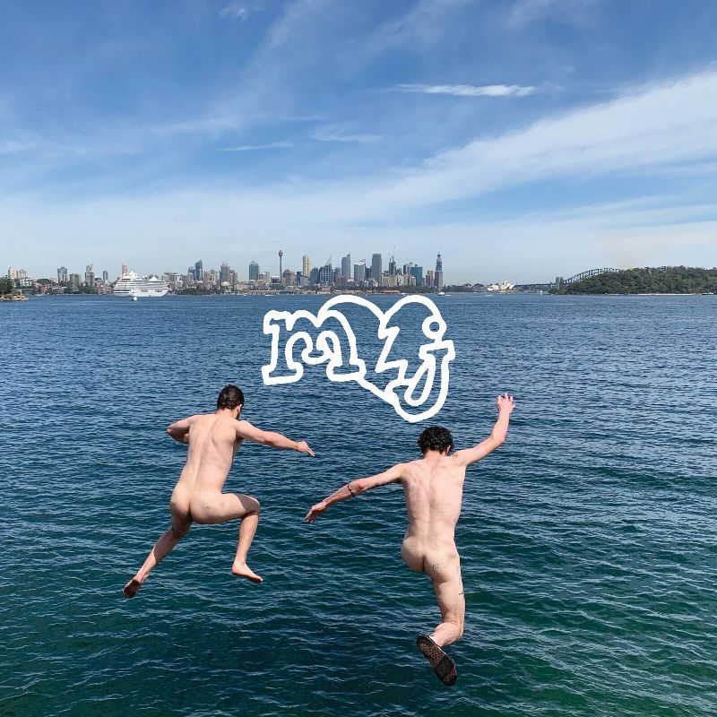 Mom Jeans Sweet Tooth album cover: two naked men facing away from the camera, jumping into the ocean with the skyline of Sydney, Australia, in the foreground