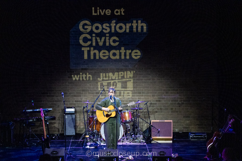 Annie Dressner playing guitar live at Gosforth Civic Centre